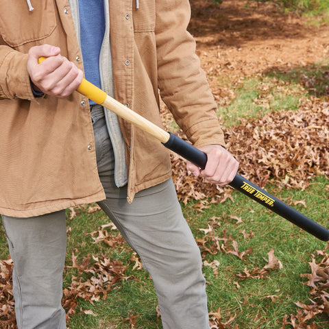 True Temper rake clearing leaves and debris efficiently.