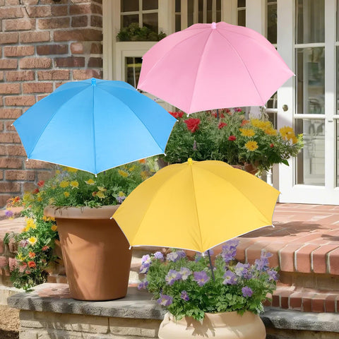 Tryly plant umbrella yellow shade shading potted herbs for sun protection.