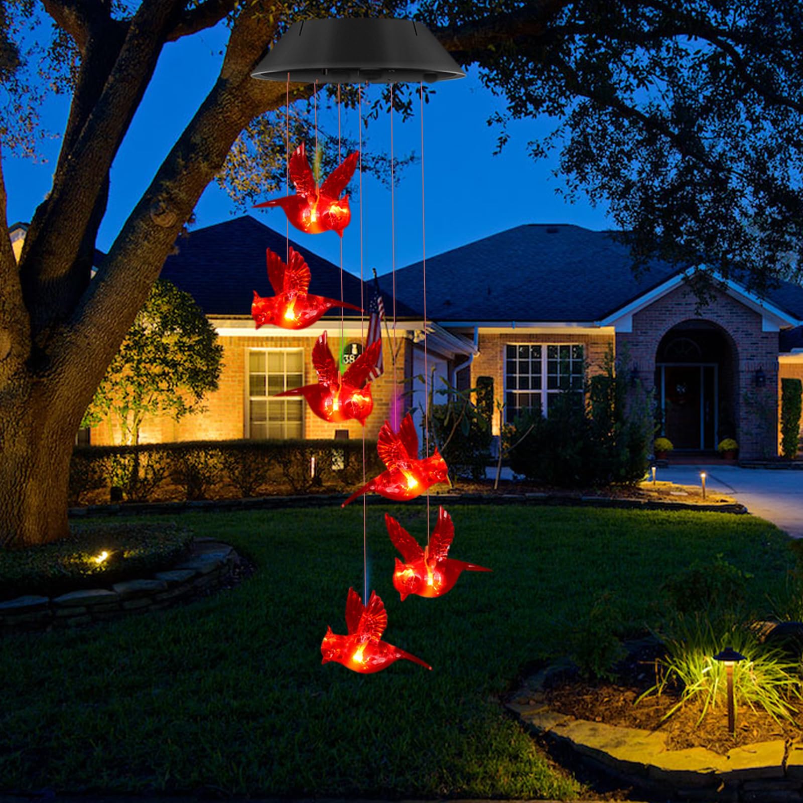 Cardinal wind chime delivering gentle chimes and bright red glow at night