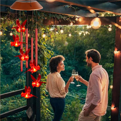 TSIPEKLO Red Cardinal Wind Chime lights at night, adding garden charm.