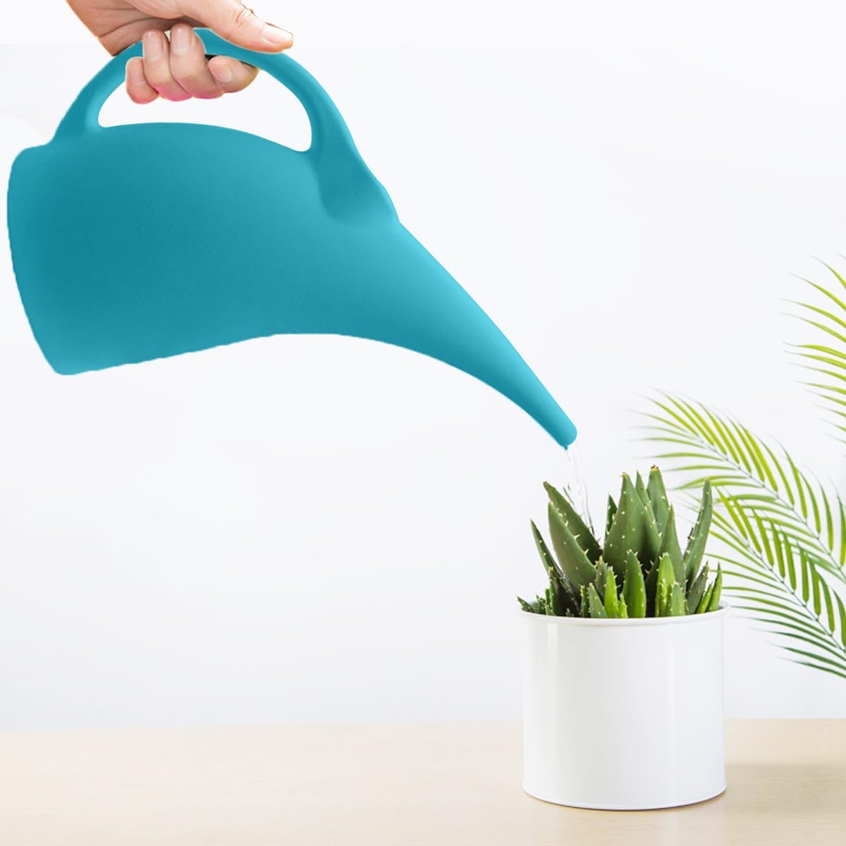 TTAOE GN blue 64-ounce capacity reduces refills during gardening tasks.