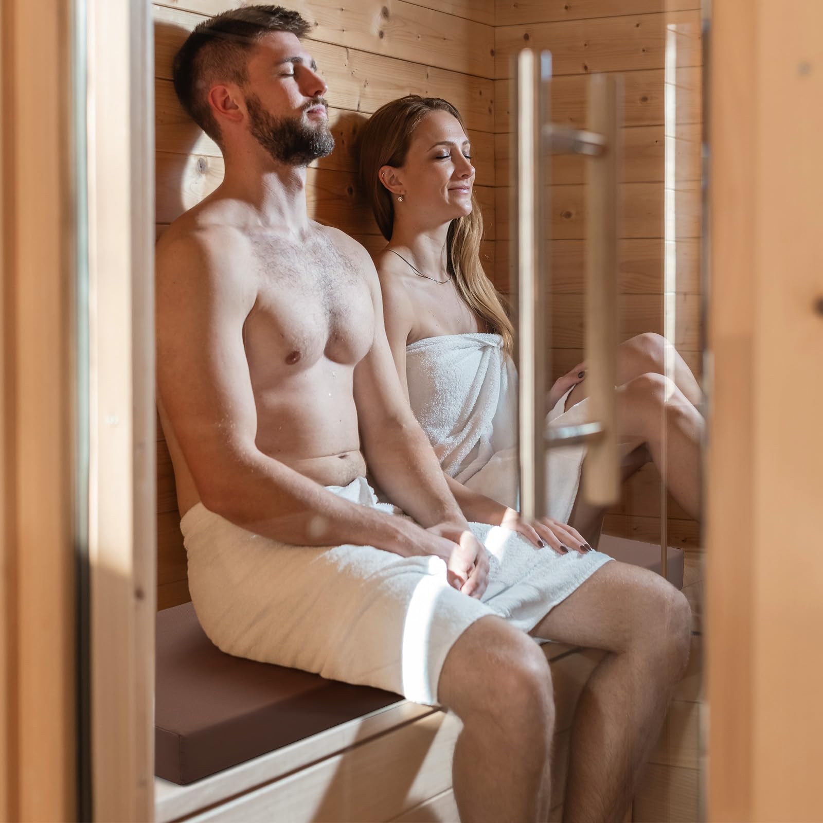 Two-person sauna bench setup shown with Tudomro cushion.