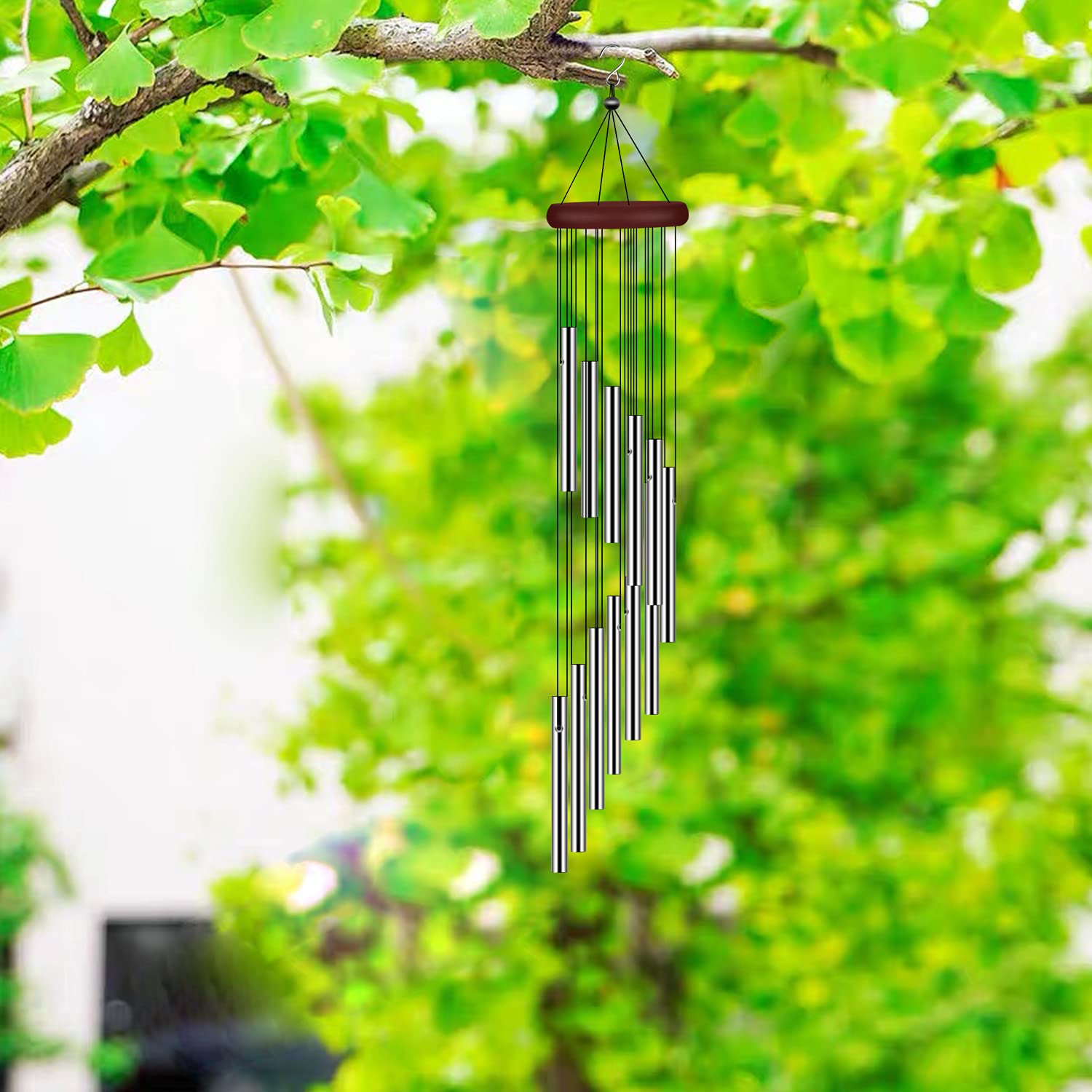 tujol patio wind chime hung on a hook for decorative outdoor charm.