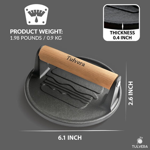 Tulvera cast-iron smash burger press on skillet for even sear.