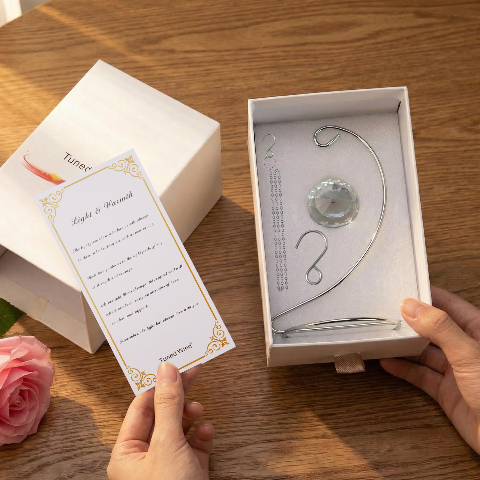 Tuned Wind crystal sphere on stand elevates table display
