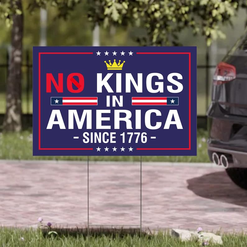 TUOCYERD 18x12 inch yard sign in a home yard, clear anti-hate message.