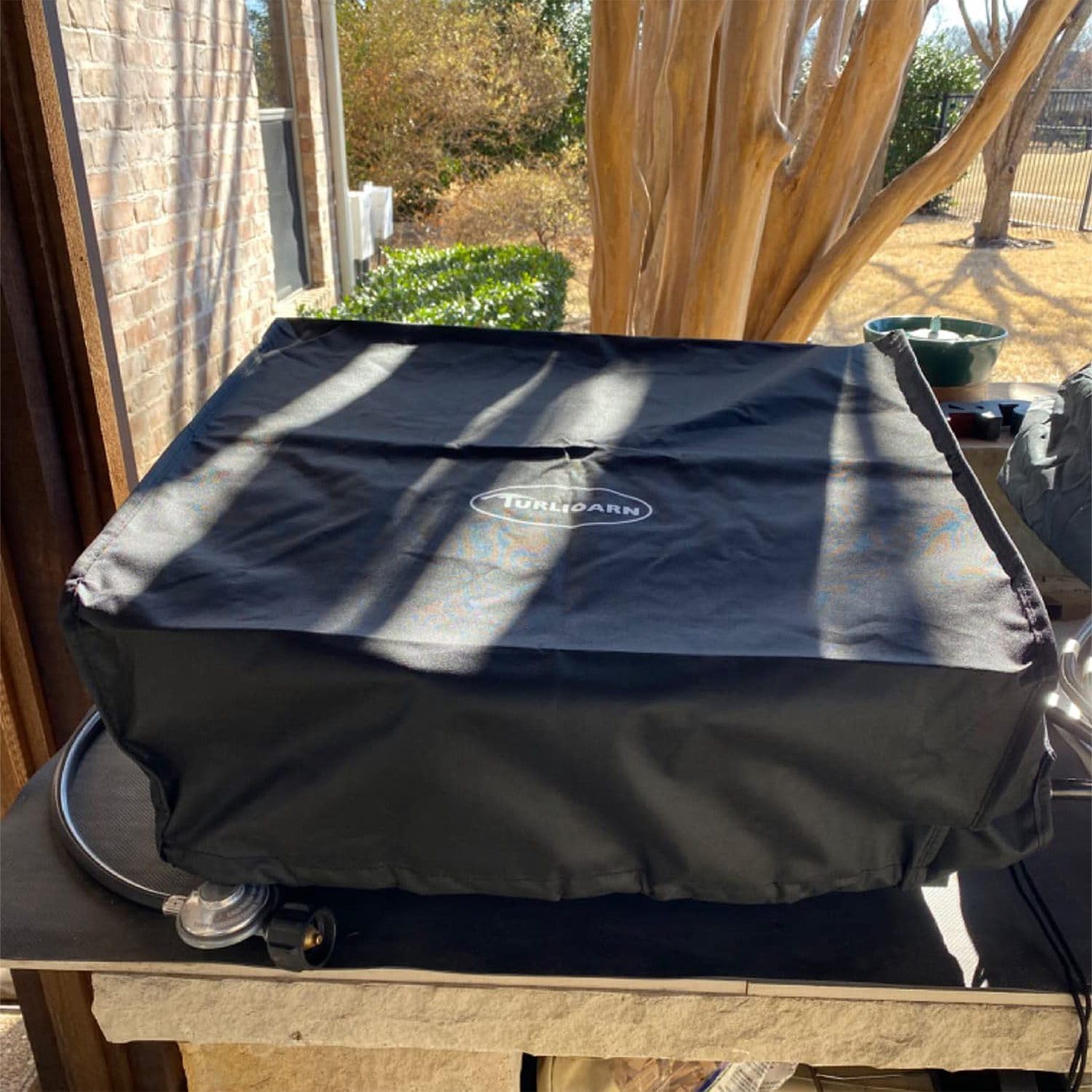 TURLIOARN PVC lining close-up highlighting waterproof protection for the griddle.