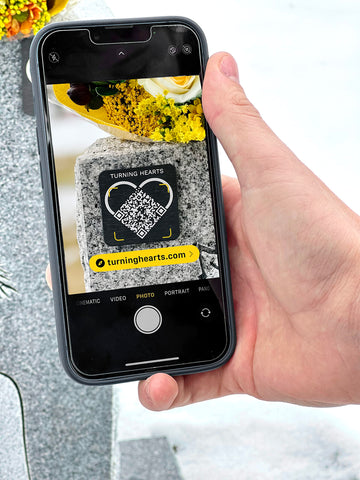 Visitors view unlimited photos and videos on a Turning Hearts memorial page.