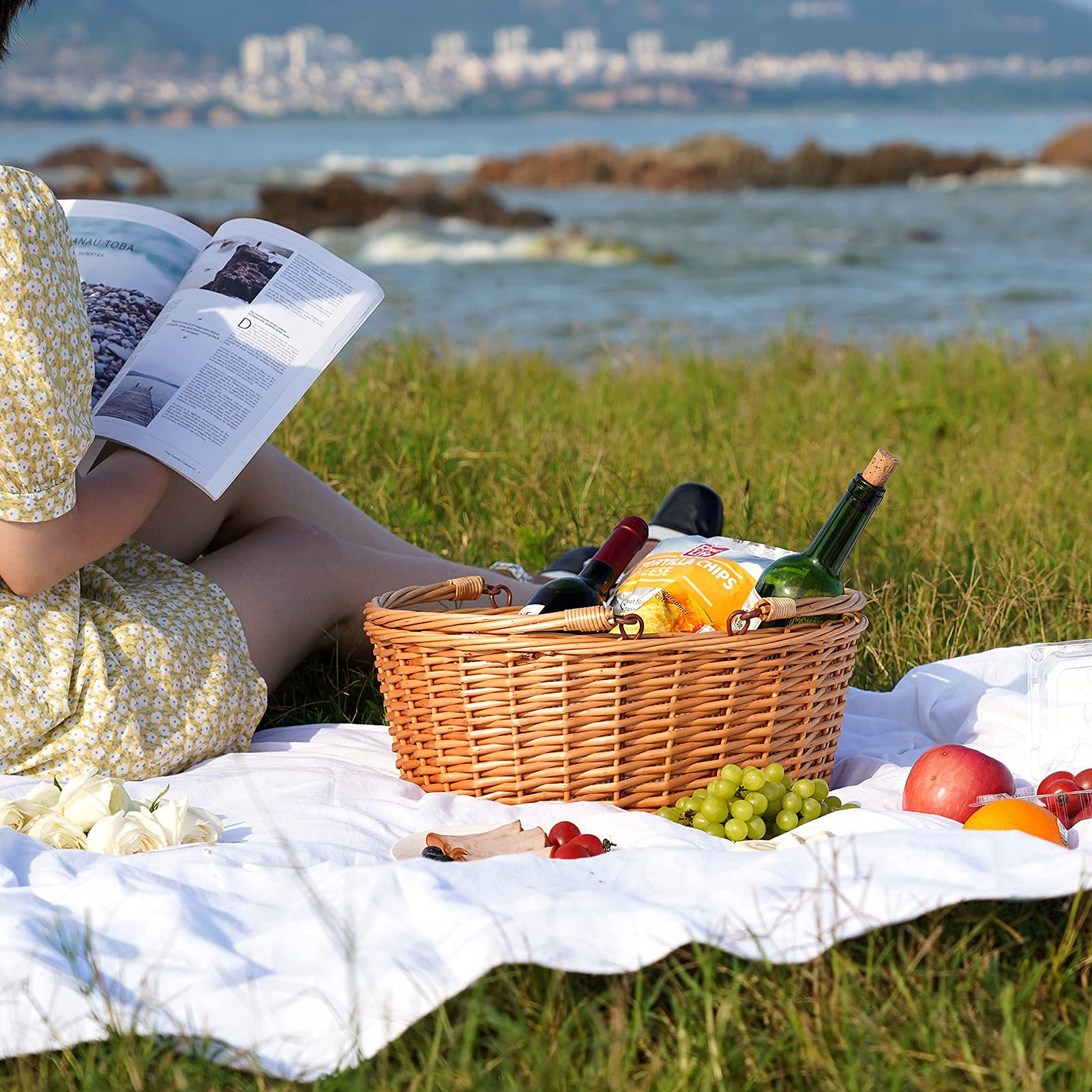 TwentyNext wicker picnic basket with double handles ready for easy, comfortable transport.