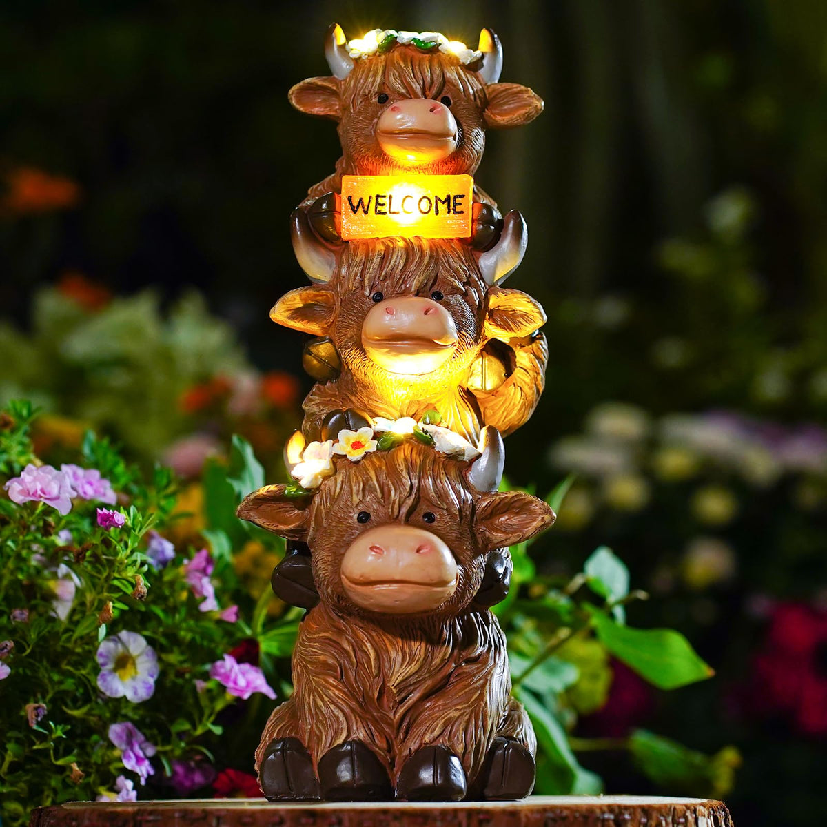 Twinbling Garden Highland Cow statue with solar light brightening outdoor spaces