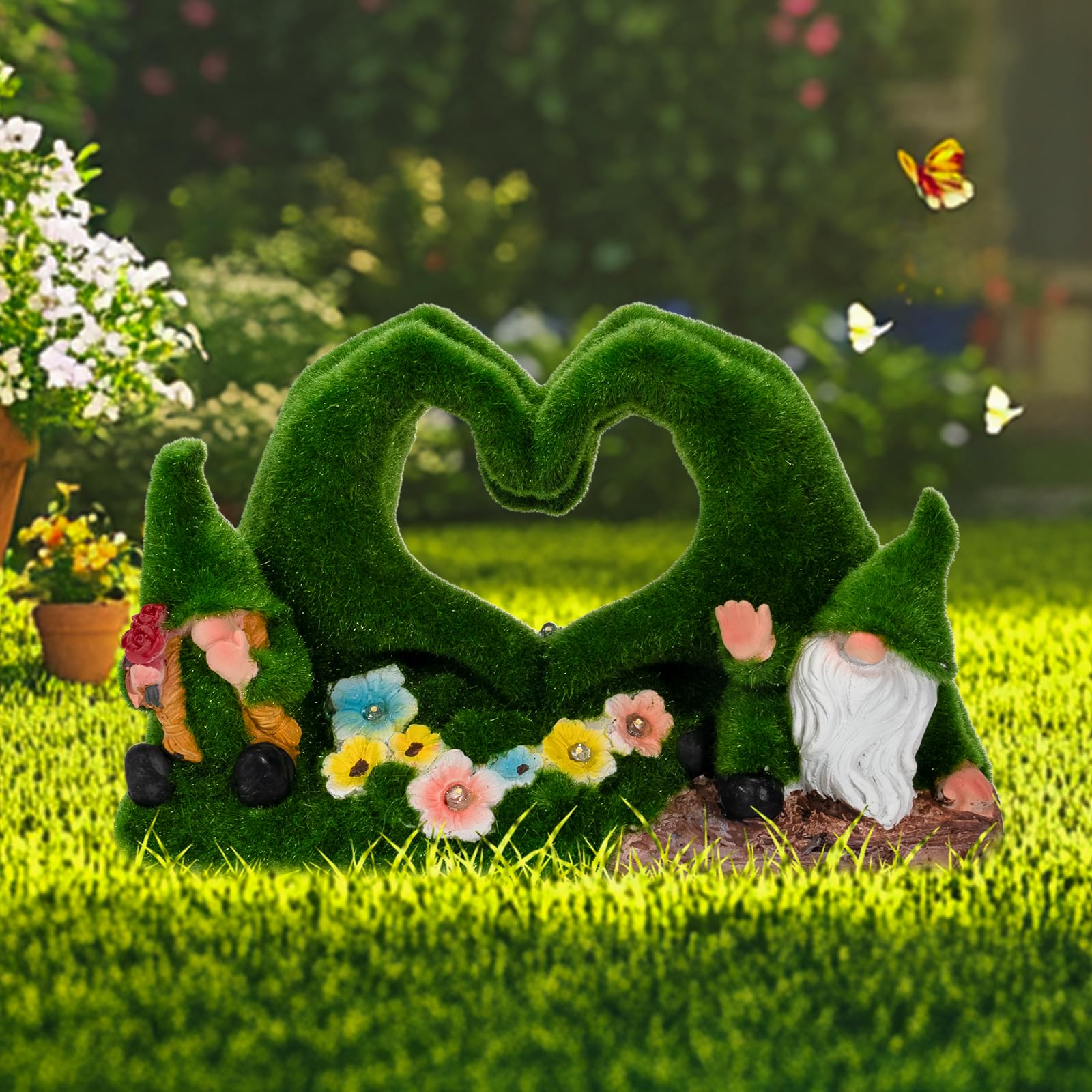 Twinbling heart-shaped moss gnome statue adds festive outdoor charm