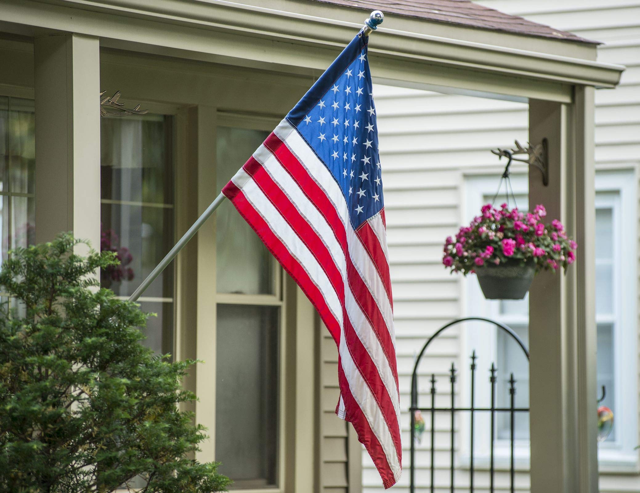 Two Group wall-mount flag holder ideal for porch or garden decor.