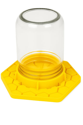 Inline honeycomb holes show anti-drowning design keeping bees safe during hydration.