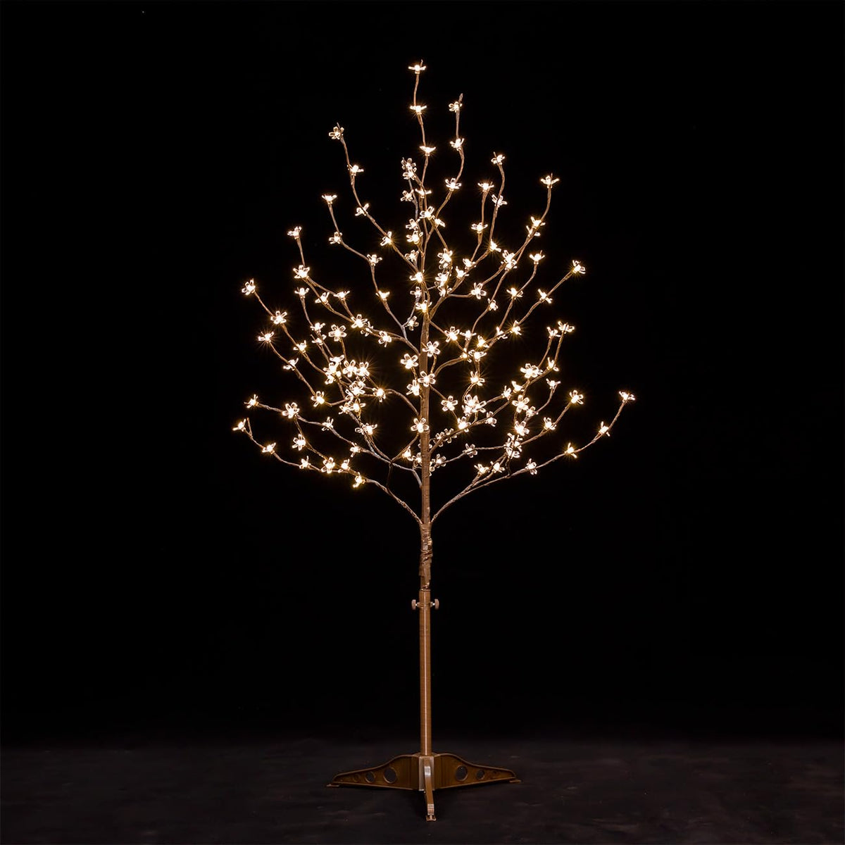 TYBEEU 4ft lighted cherry blossom tree front view highlights warm ambiance for indoor or outdoor spaces.