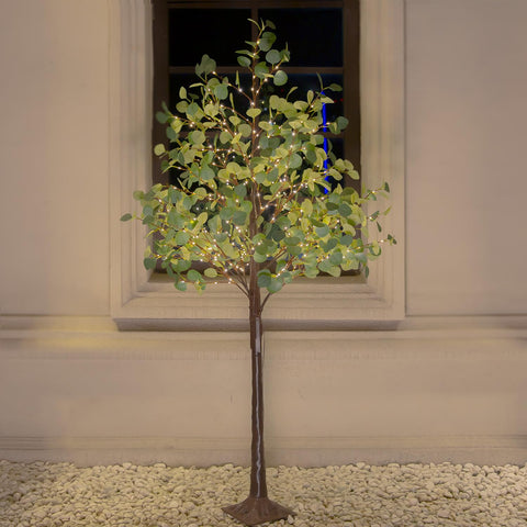 TYBEEU 6ft lighted eucalyptus tree with warm LEDs, ideal for cozy indoor spaces