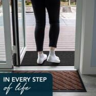 ubdyo bright black door mat hides dirt and blends with exterior decor.