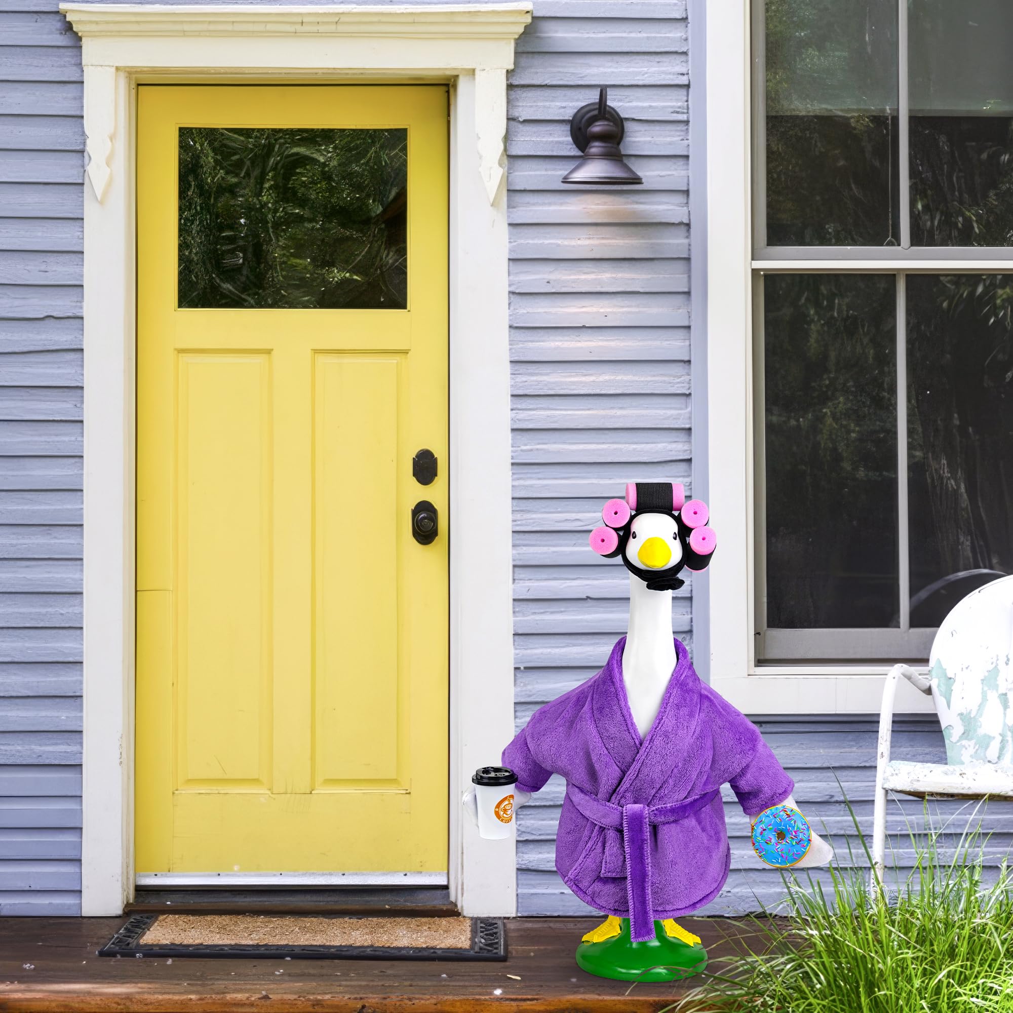 Ueyben Lady Goose Costume on purple fabric stands out in yard.