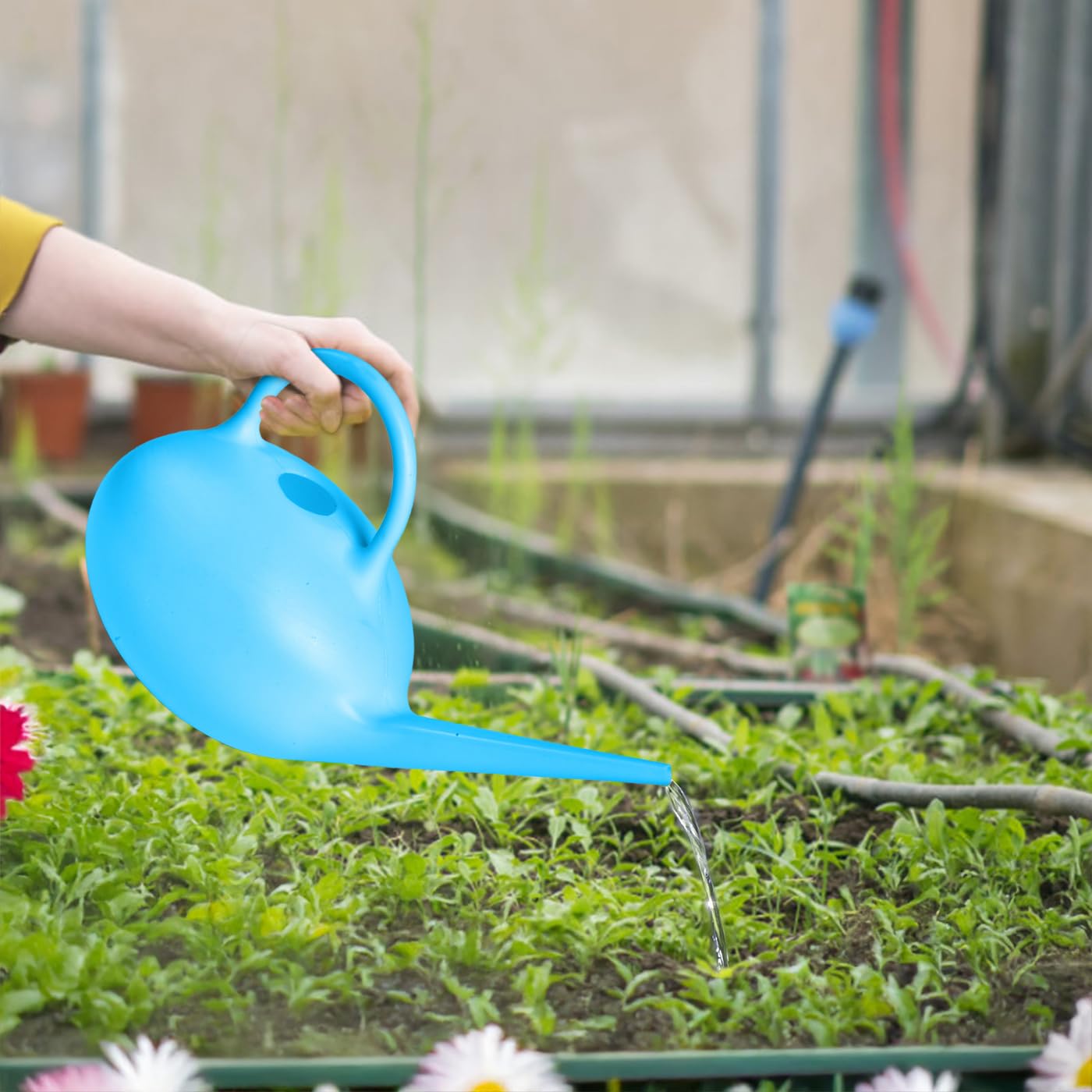 UFANME blue watering can closeup features smooth finish and sturdy build.