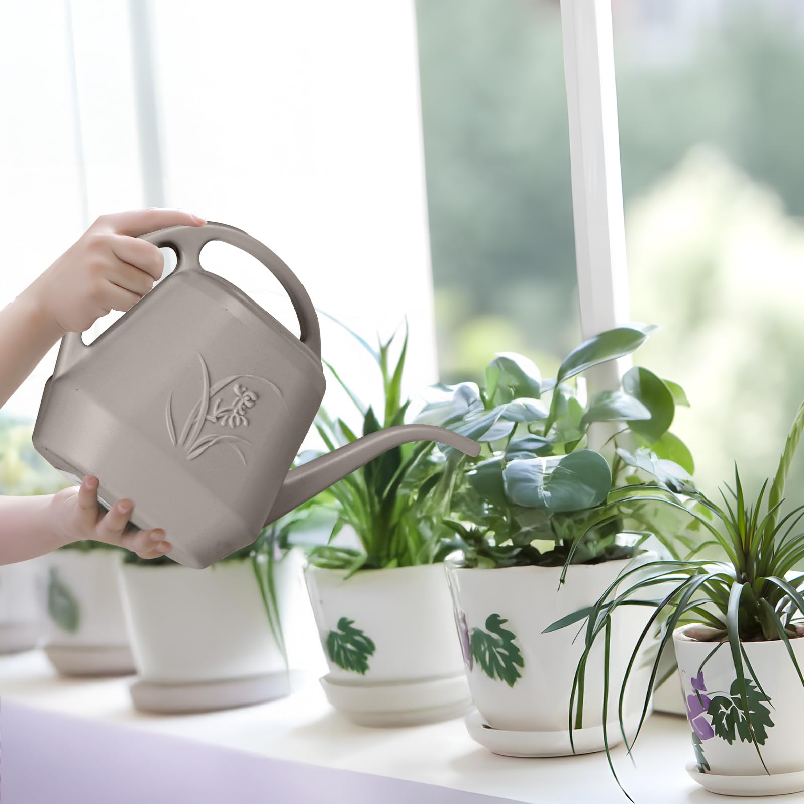 UFANME top-view of coffee-color watering can highlighting its pour-friendly design.