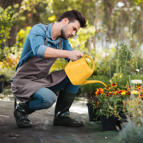 UFANME Watering Can in bright orange for visible, user-friendly use.