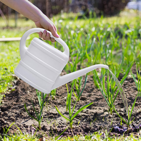 UFANME smooth flow spout helps reduce spills when watering.
