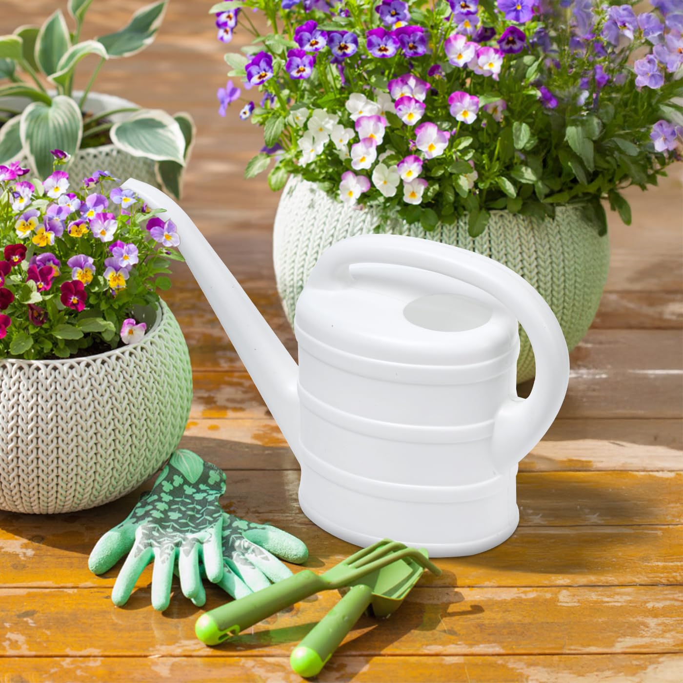 UFANME white watering can complements home décor while watering plants.