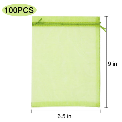 Uigidori plant protection bag in garden demonstrates simple double-drawstring closure