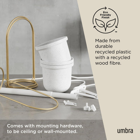 Umbra Triflora drainage hole option for managing watering needs.