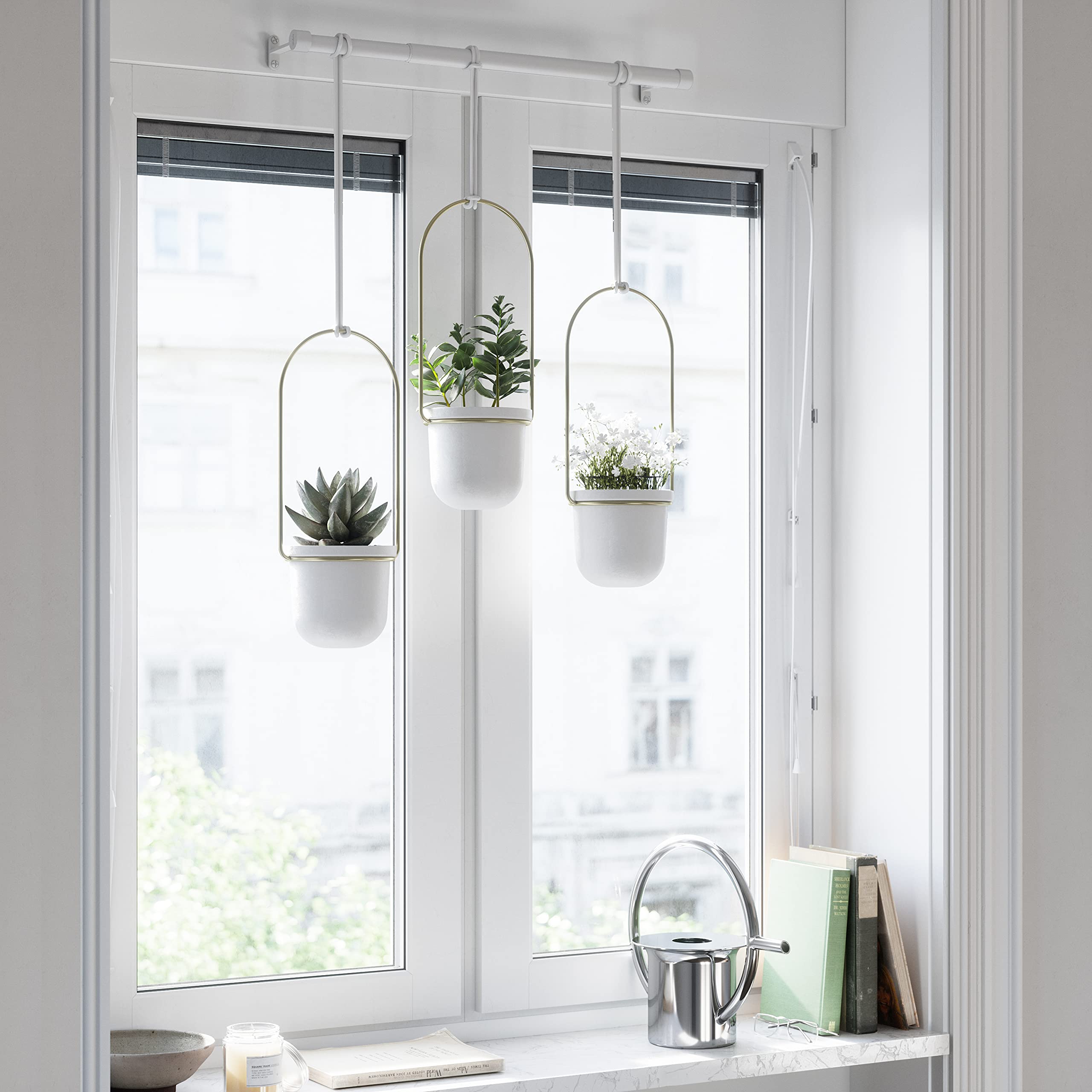 Umbra Triflora includes mounting hardware for quick wall or ceiling setup.
