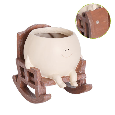 UMESONG resin planter suitable for indoor and outdoor decor with small plants.