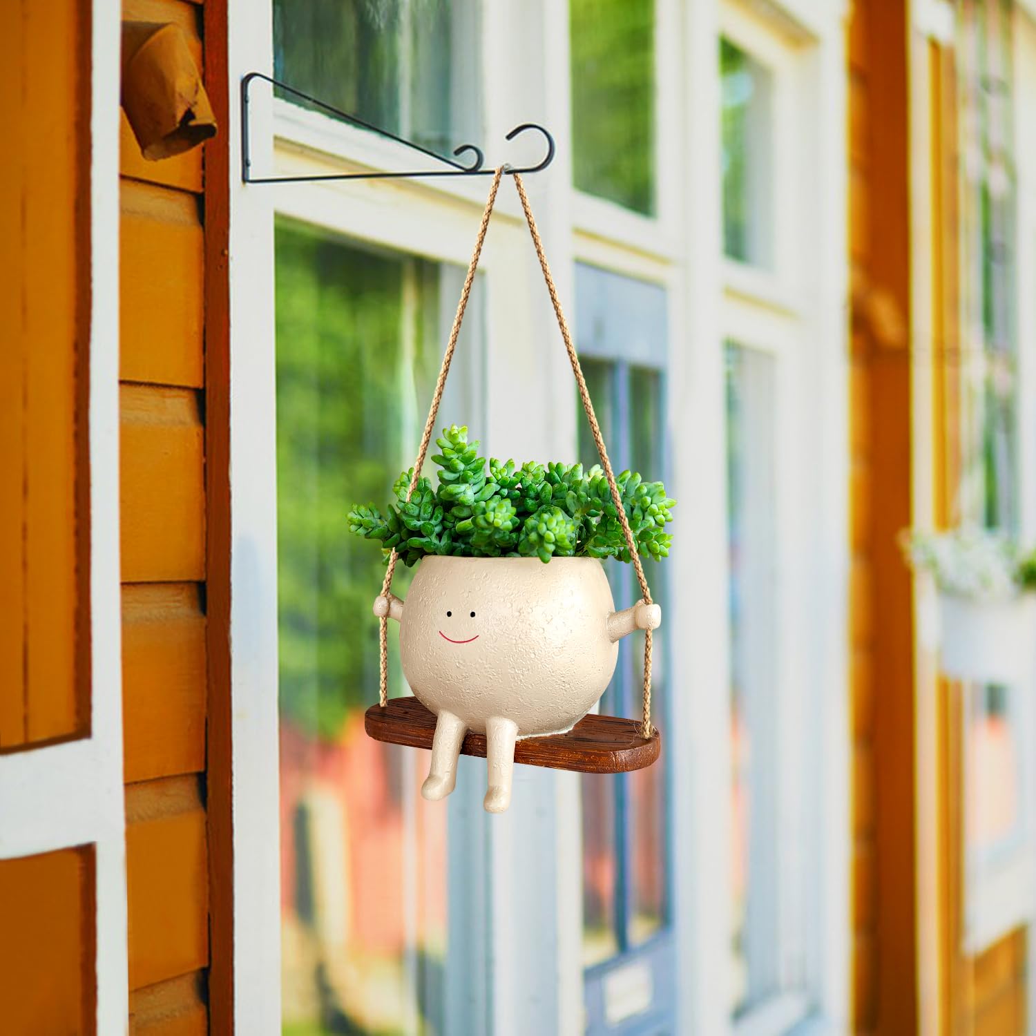 UMESONG swing planter enhances string of pearls display indoors.