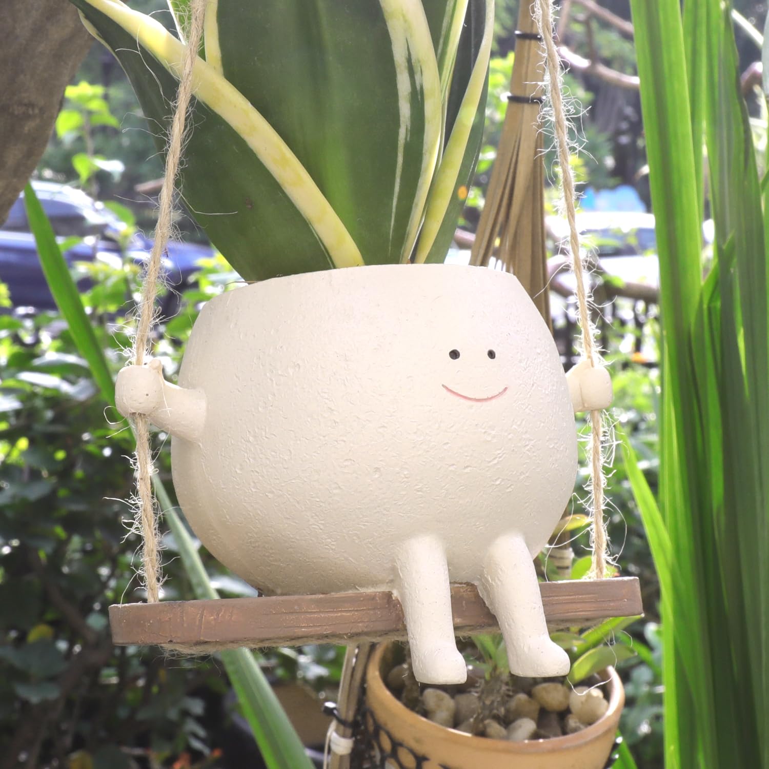 UMESONG Swing Face Planter hanging for indoor decor with a cheerful face.