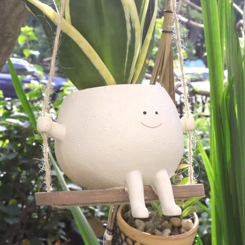 UMESONG Swing Face Planter hanging for indoor decor with a cheerful face.