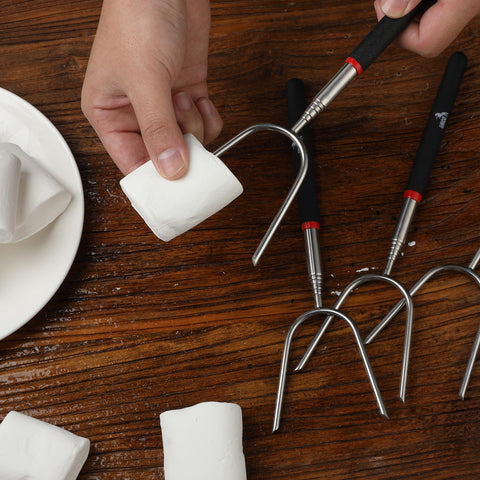 UNCO campfire accessories offer durable, rust-resistant roasting sticks for backyard gatherings.