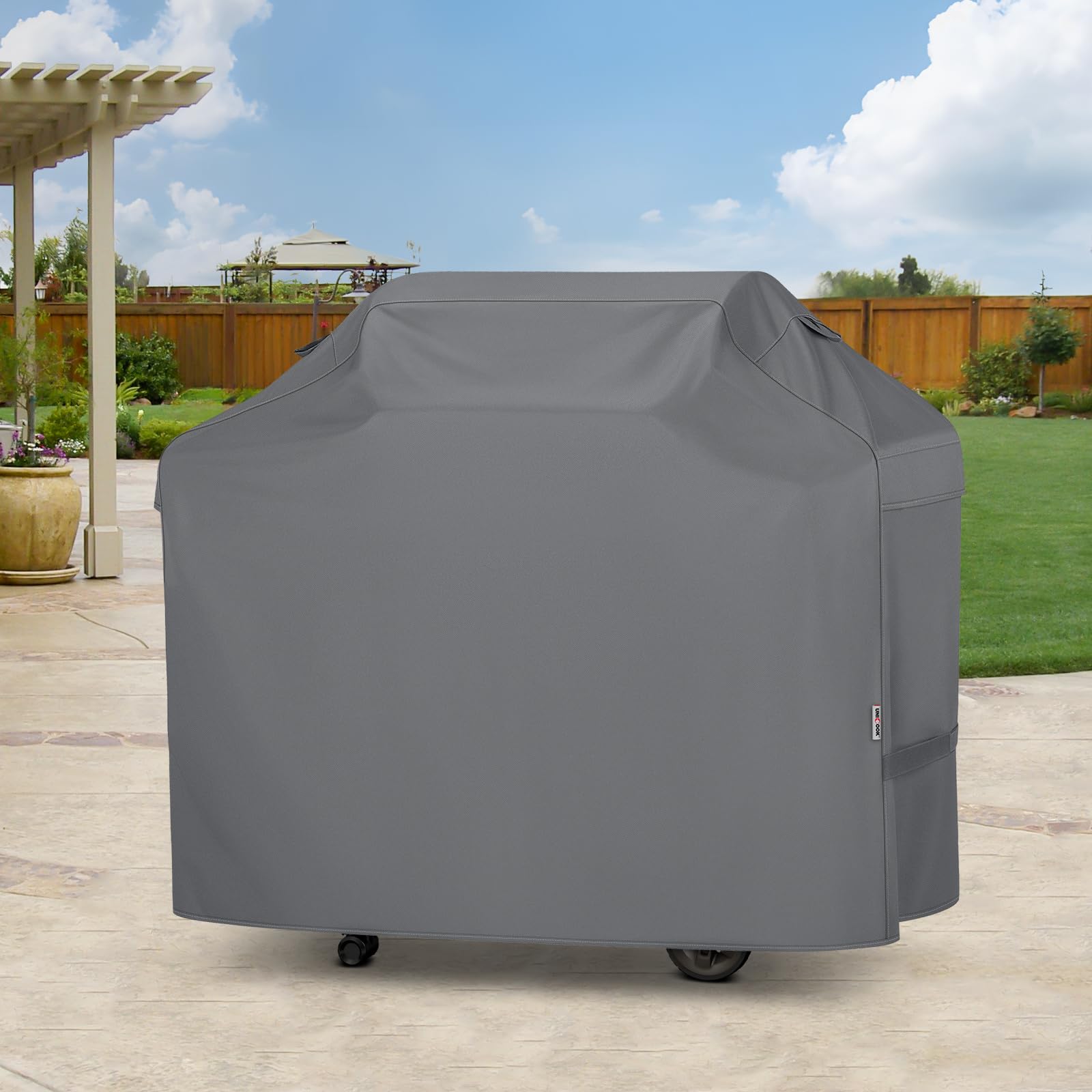 Unicook gray grill cover provides all-season outdoor protection.