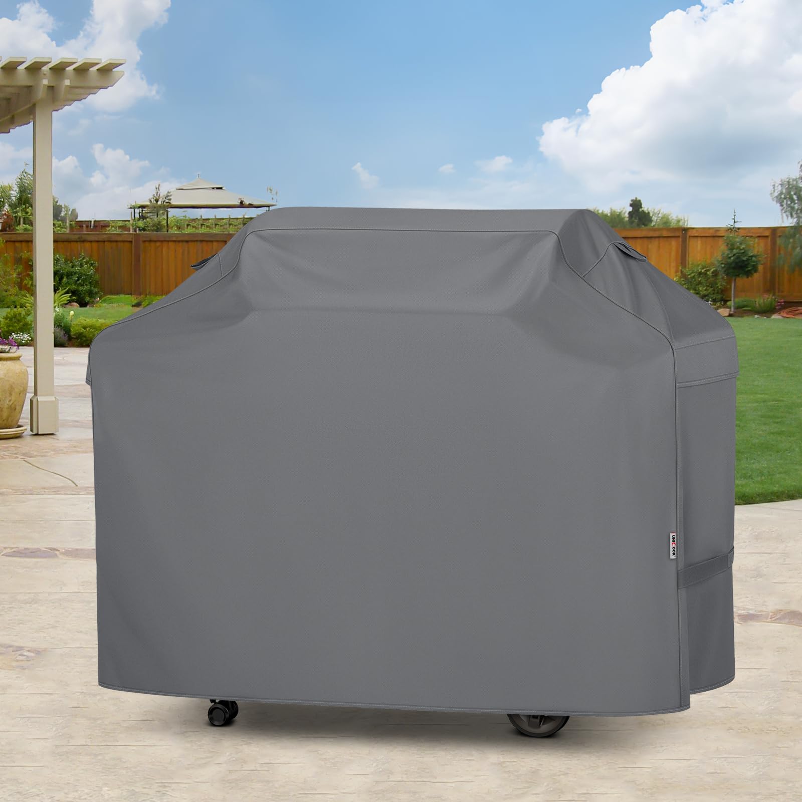 Unicook grill cover hanging loops for convenient storage when not in use.