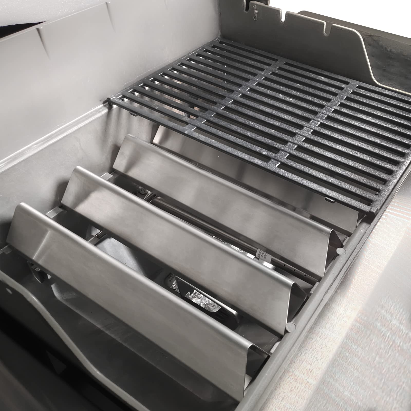 Uniflasy 7636 flavorizer bars in use on Weber grill for even cooking