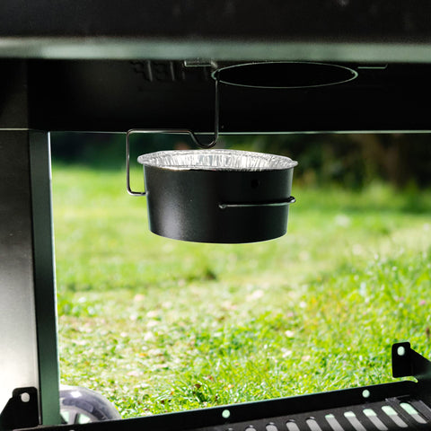 Foil liner placed inside the Uniflasy grease cup for mess-free grilling.