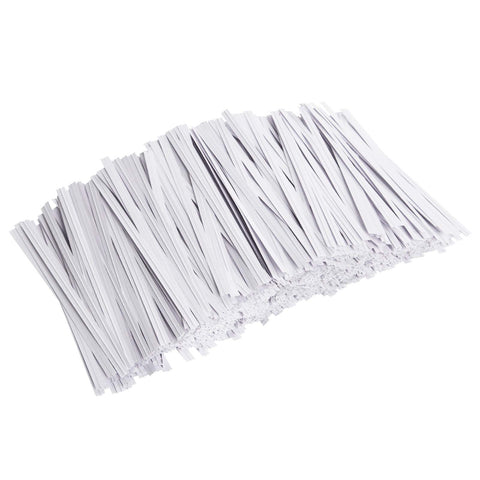 Unves 4-inch white twist ties close-up with sturdy paper coating for bag sealing.