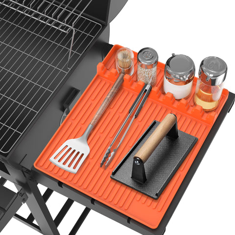Uozuke silicone griddle mat on side shelf keeps utensils organized