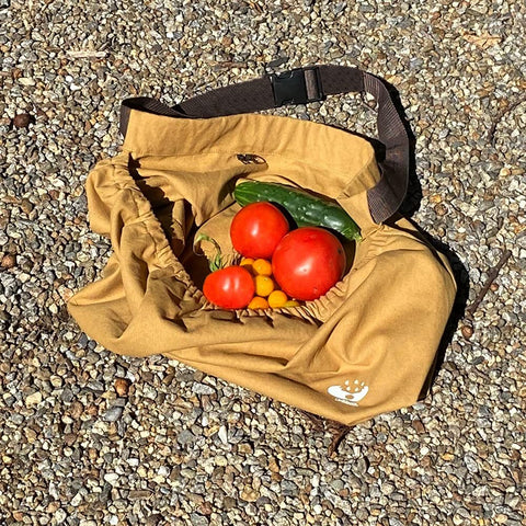 UpBloom berry picker use offers hands-free harvesting with convenient pockets.