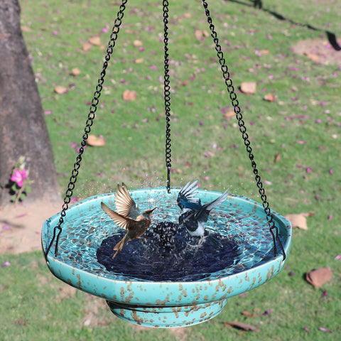 UPSJYJ ceramic bird bath hanging above garden greenery for charm