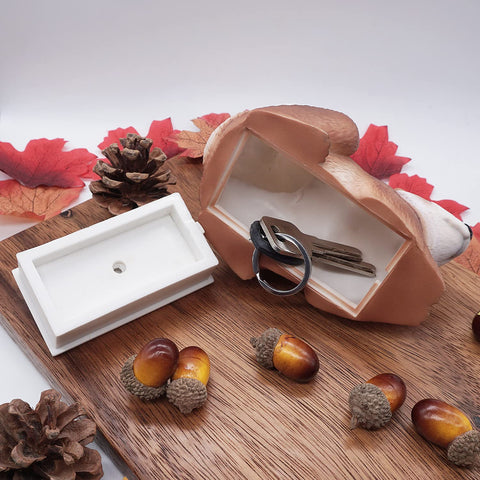 USEAMIE playful yet practical garden accent with the squirrel key hider.