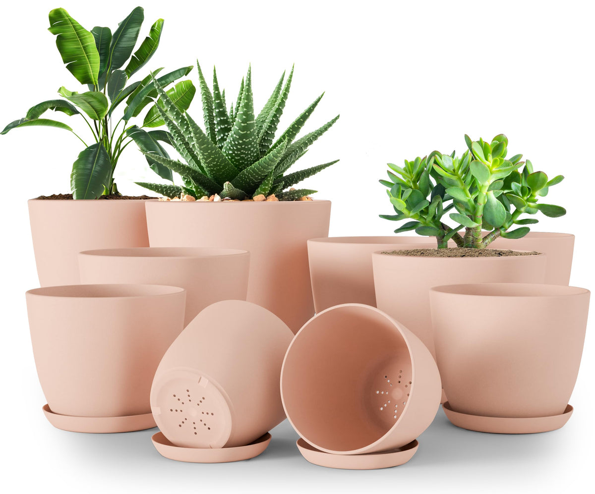 Utopia Home pink plant pots set of 10 with drainage for indoor gardening.