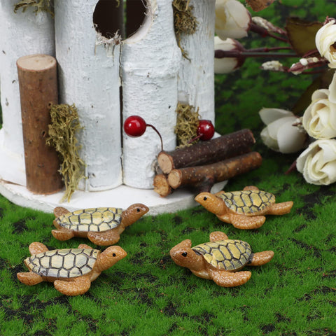VAIPI sea turtle figurine in a garden scene near succulents.