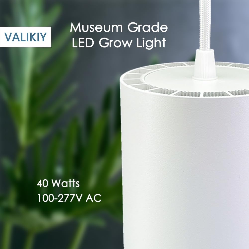 VALIKIY hanging grow light side view showing full-spectrum glow supporting vibrant plant color.