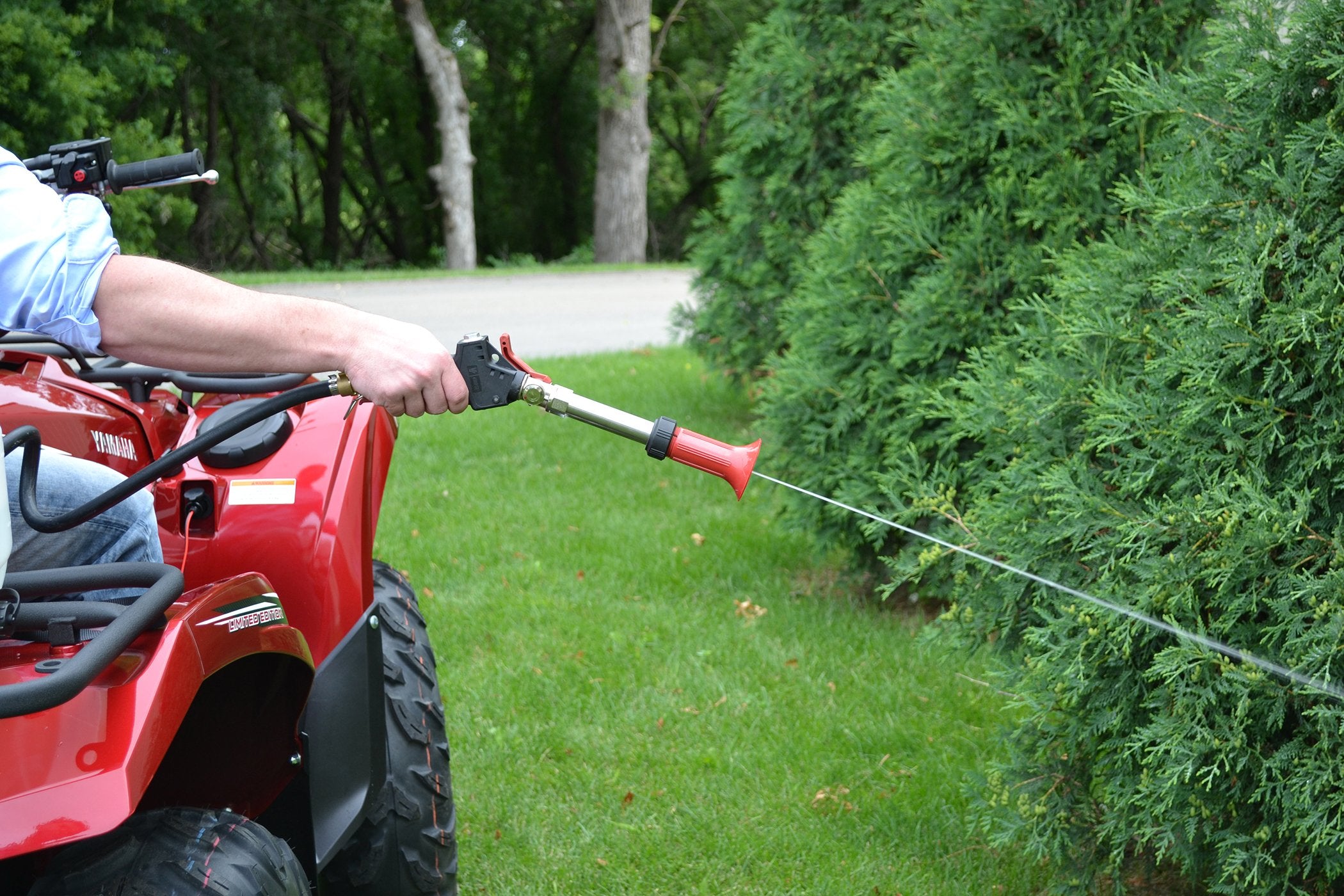 Valley Industries spray gun thumb-lever action enabling quick stream to mist transitions.