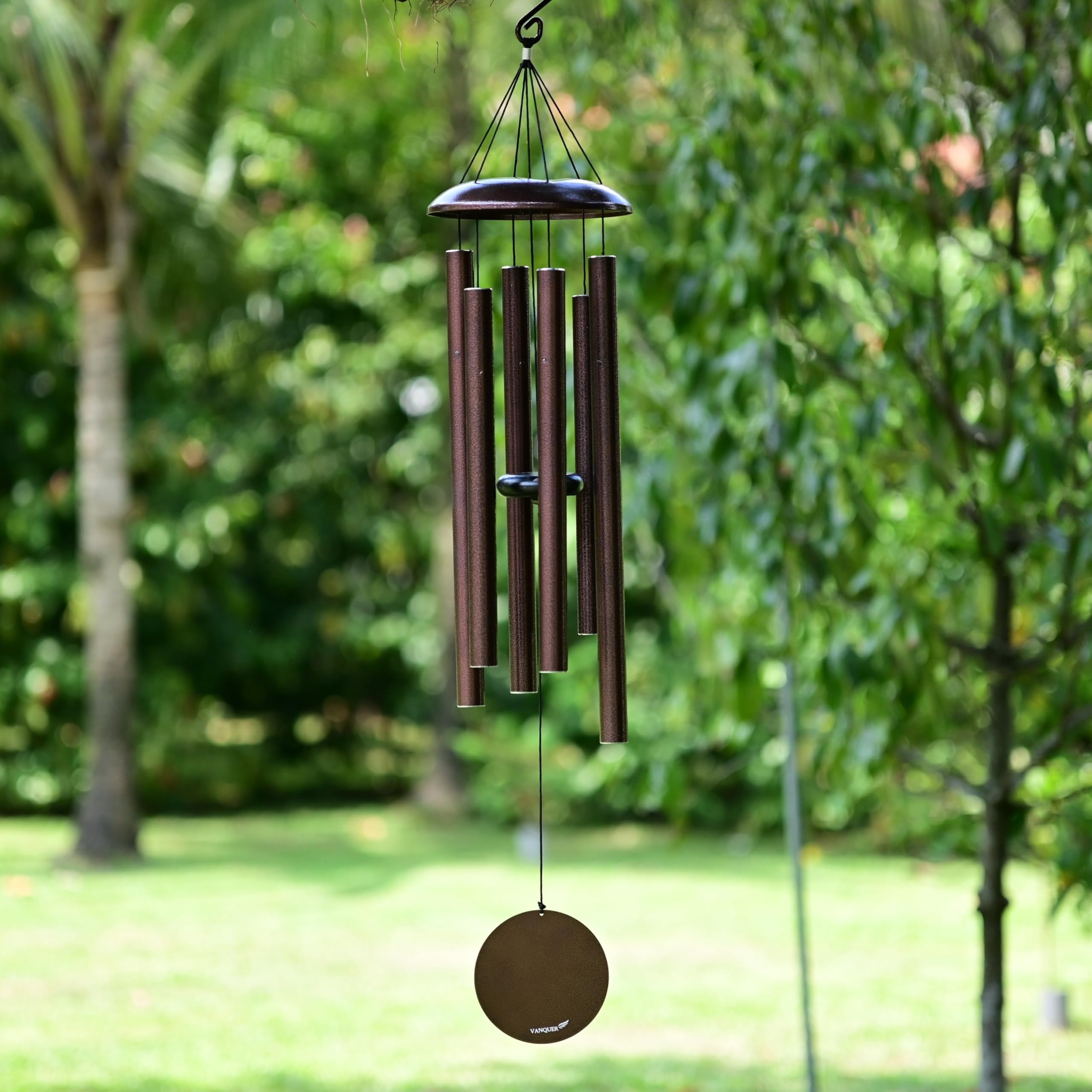 Vanquer wind chimes outside with deep tone and 38-inch presence for garden ambience.