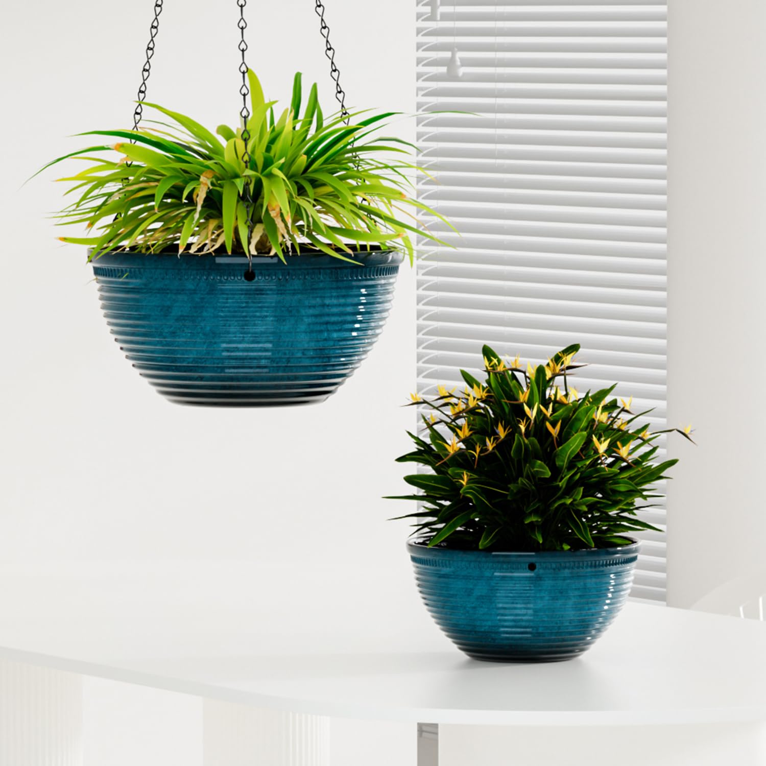 Vanslogreen blue hanging planters support lush greenery in garden spaces.