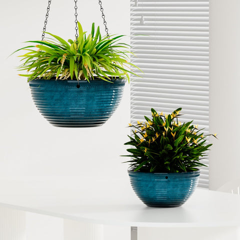 Vanslogreen blue hanging planters support lush greenery in garden spaces.